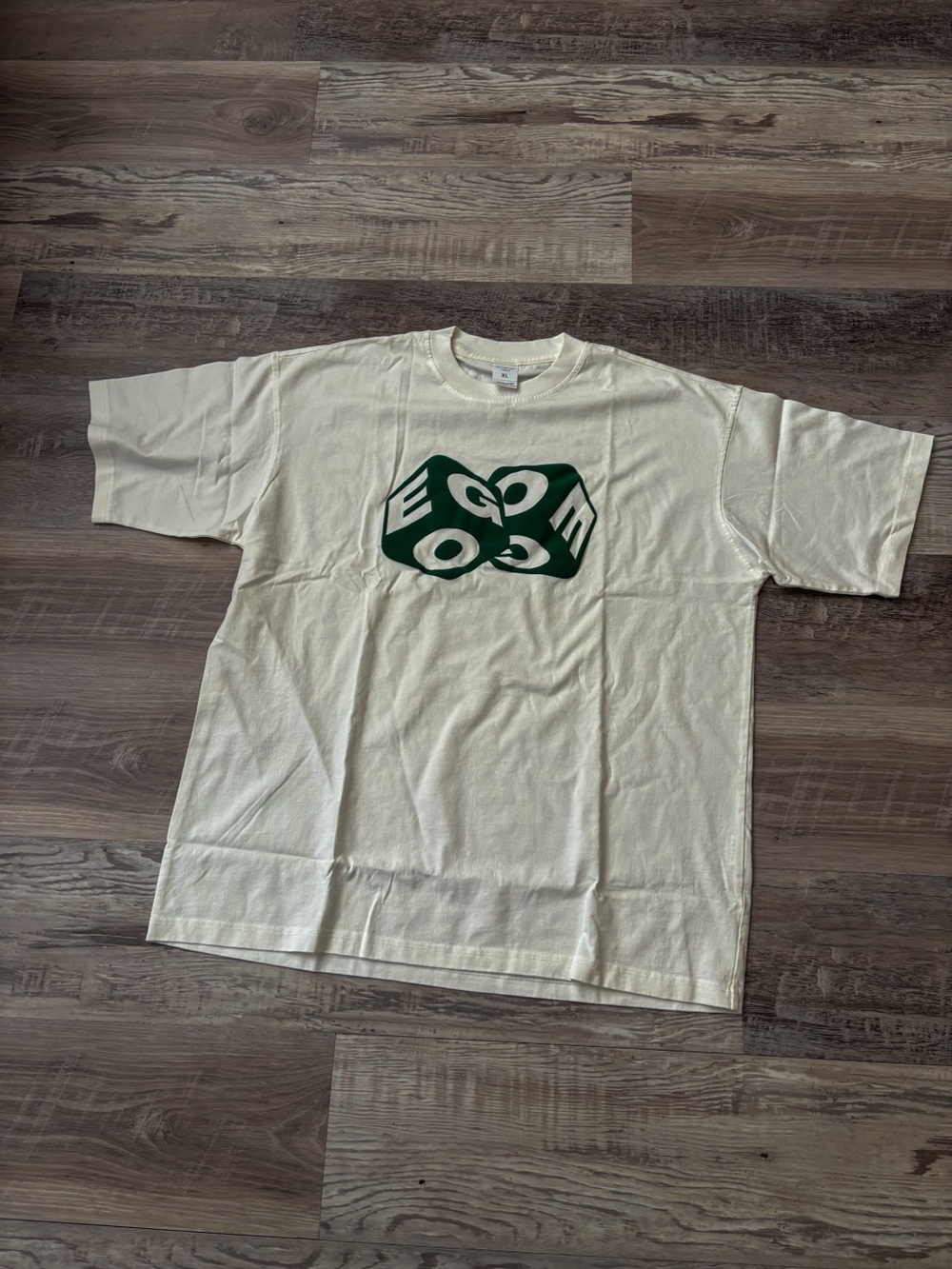 EGO Cream Tee with Dark Green Logo